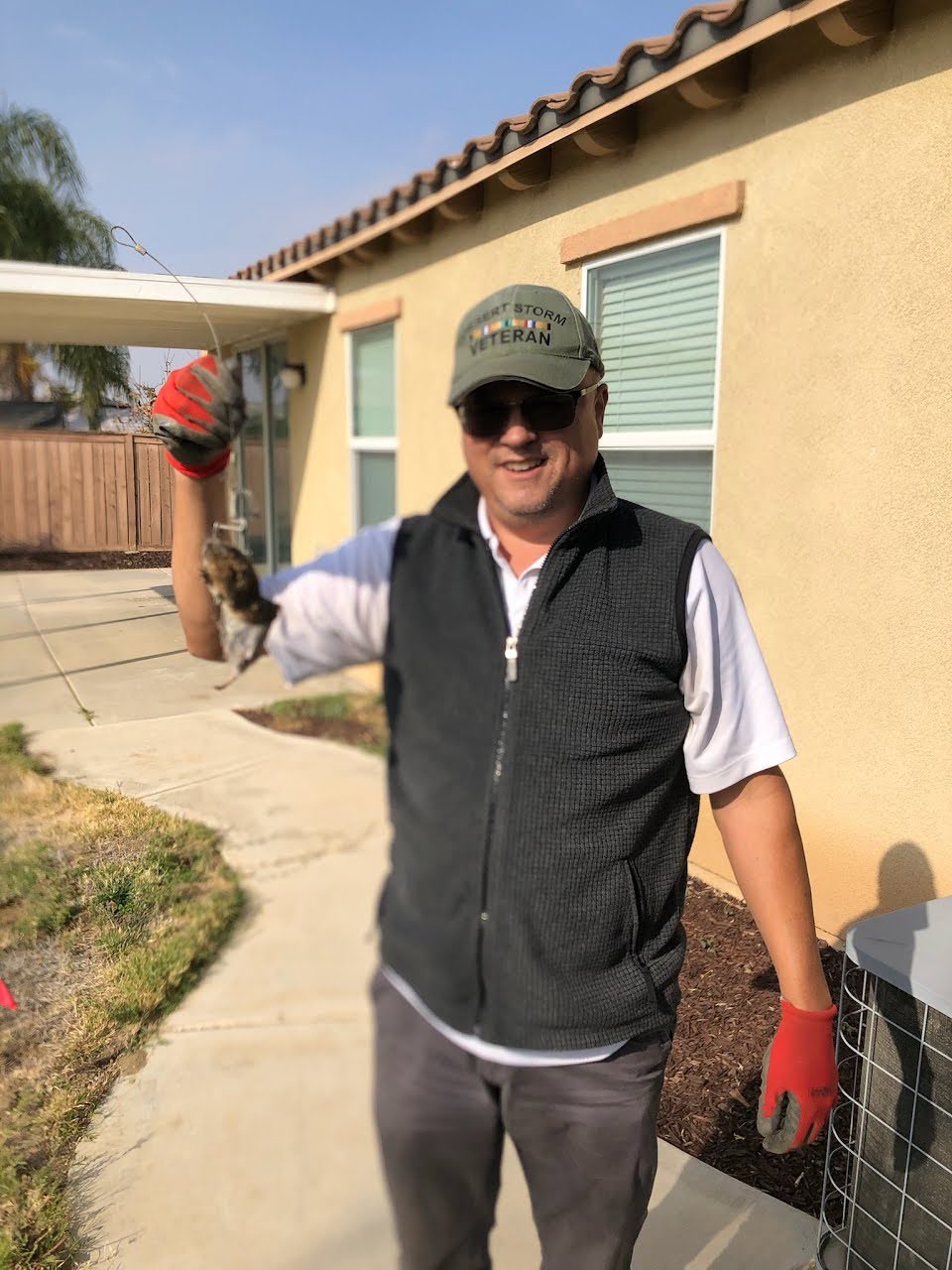 Larry from Gopher Stop with a trapped gopher